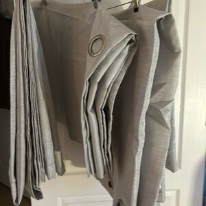 Four (4) silver curtains
